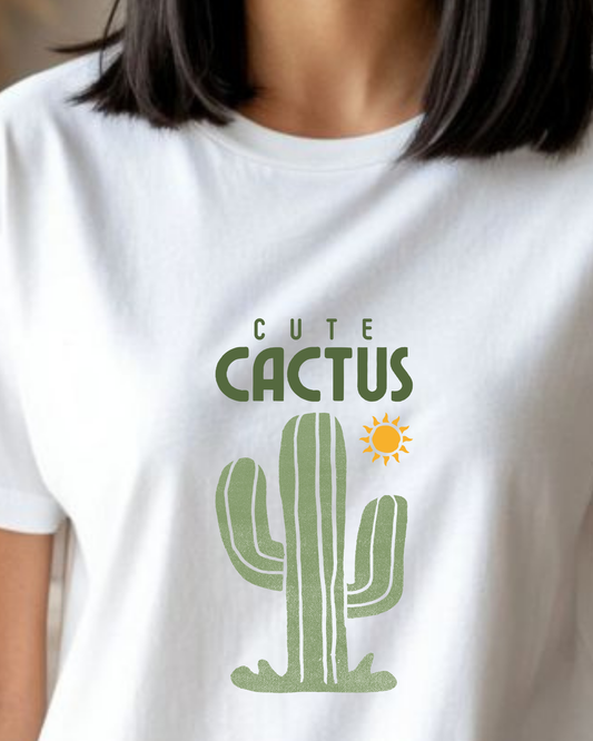 White t-shirt with a green cactus graphic and 'Cute Cactus' text on a plain background