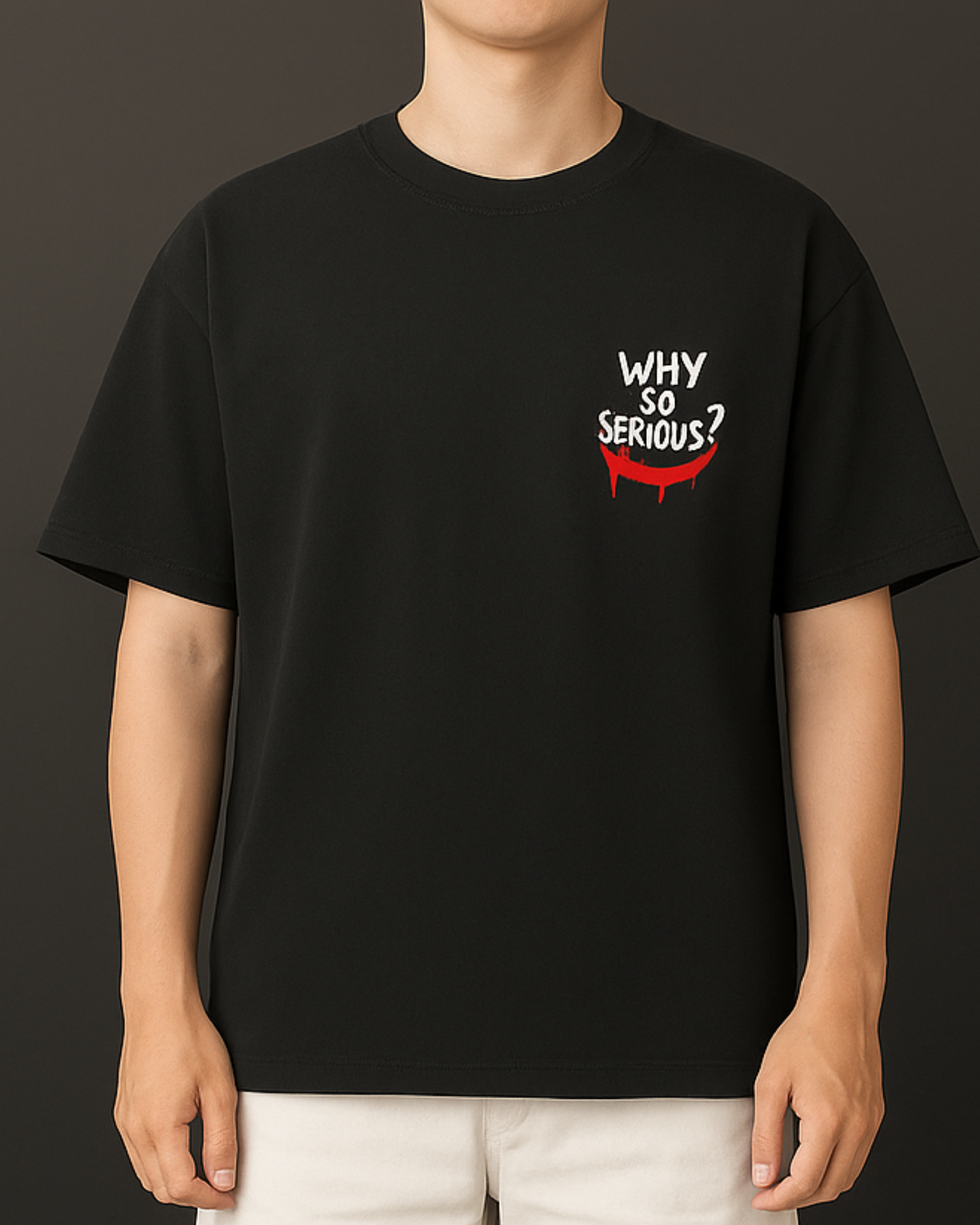 black t-shirt with 'Why So Serious?' graphic design.