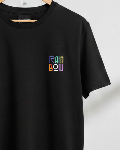 Black t-shirt with 'RAINBOW' in colorful letters on a white background