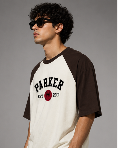 maroon and off white oversized raglan T-shirt for men and women featuring a premium 180 GSM cotton melange fabric, drop shoulder fit, half sleeves, and Parker graphic print by White Bear Clothing.