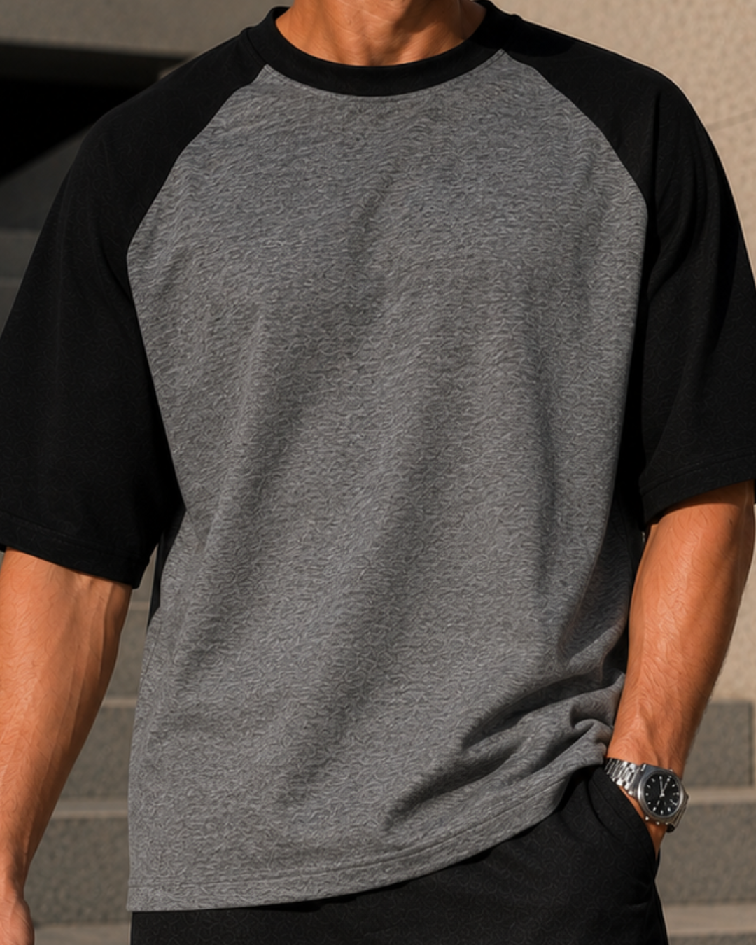 Men wearing oversized charcoal melange and black raglan T-shirt made from 100% cotton 180 GSM premium streetwear oversized fit from white bear brand