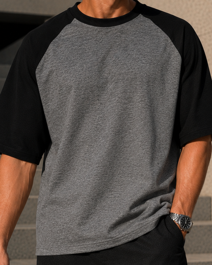 Men wearing oversized charcoal melange and black raglan T-shirt made from 100% cotton 180 GSM premium streetwear oversized fit from white bear brand