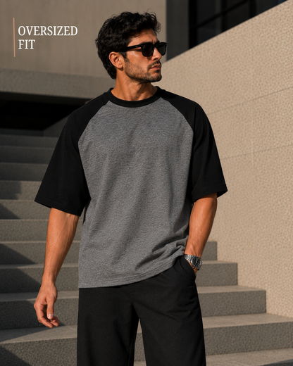 Men wearing oversized charcoal melange and black raglan T-shirt made from 100% cotton 180 GSM premium streetwear oversized fit from white bear brand