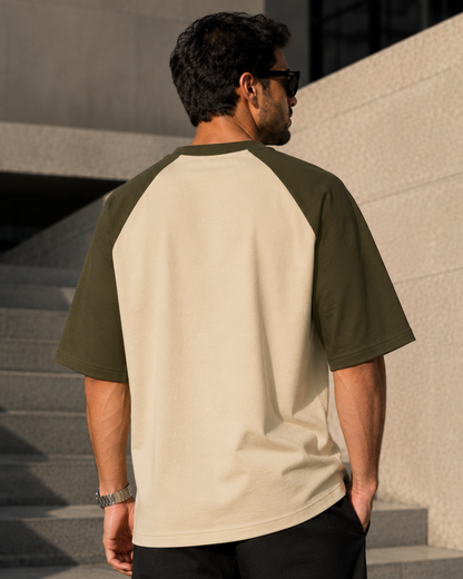 Men wearing oversized olive green and off white raglan T-shirt made from 100% cotton 180 GSM premium streetwear oversized fit from white bear brand