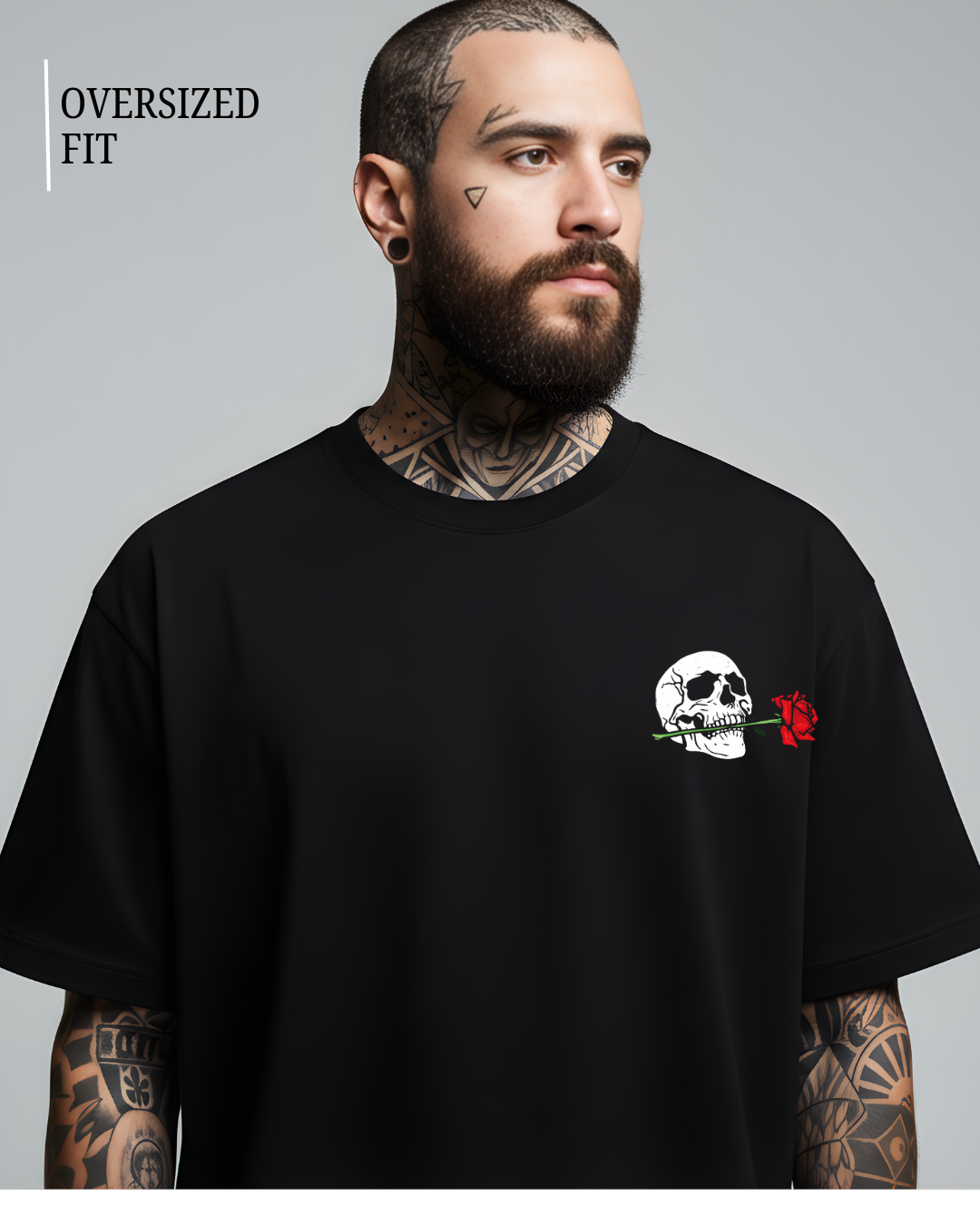 Man wearing a black t-shirt with a skull and rose design on a gray background
