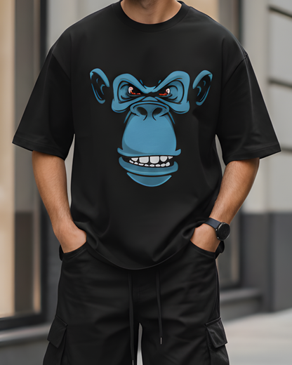 Person wearing a black t-shirt with a blue gorilla graphic outdoors.