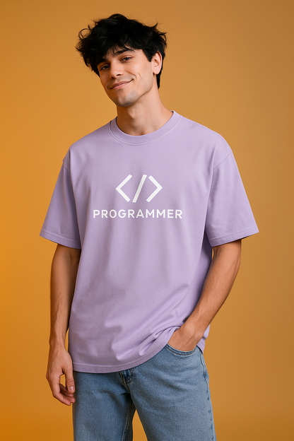 Person wearing a purple t-shirt with 'PROGRAMMER' text and code symbols on an orange background