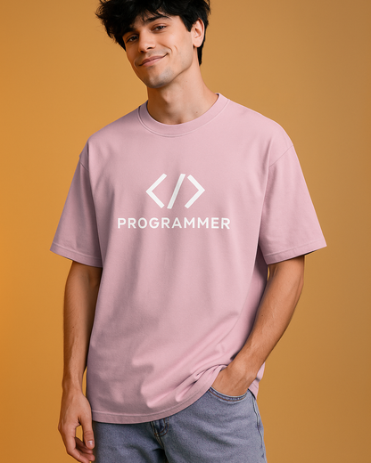 Person wearing a pink t-shirt with 'PROGRAMMER' and code symbols on an orange background