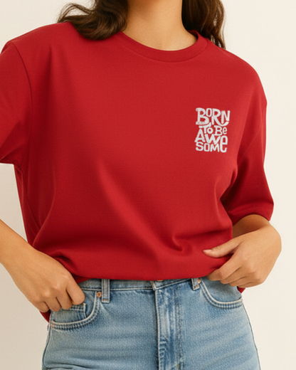 Person wearing a red sweatshirt with white text, standing against a plain background