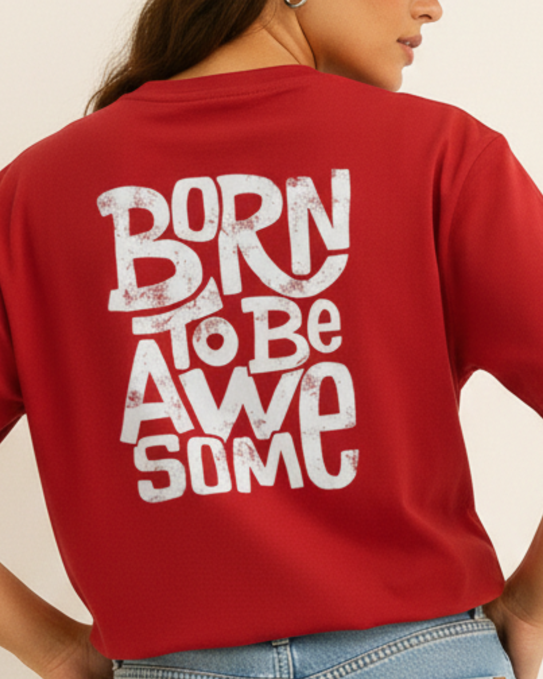 Red t-shirt with 'Born to be Awesome' text on the back, worn by a person.