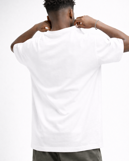Person wearing a white t-shirt with arms behind head on a plain background