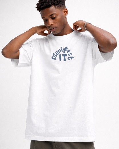 Person wearing a white t-shirt with text on a plain background