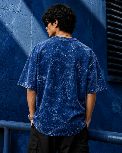 unisex navy blue acid wash oversized T-shirt made from 100% cotton with 240 GSM heavyweight breathable fabric, featuring a premium vintage washed finish and relaxed streetwear fit from white bear brand