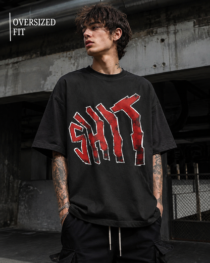 oversized black t-shirt with a bold red and white 'SHIT' graphic on the front, from white bear brand