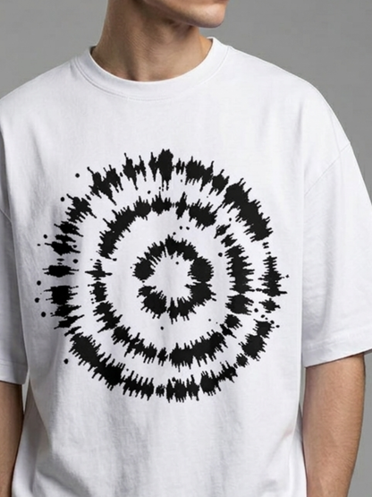 White t-shirt with a black spiral pattern on a gray background
